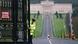 Policeman opens gate to Northern Ireland parliament Policeman opens gate to Northern Ireland parliament