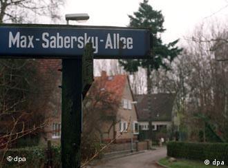 A street sign in memory of the former Jewish owners
