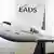 Airbus model in front of an EADS logo