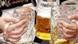 Mugs of beer at Oktoberfest Mugs of beer at Oktoberfest