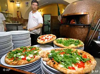 意大利批萨饼在很多国家都倍受“懒汉”欢迎。
