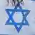 Başbakan Ariel Şaron'un çekilme planlarına karşı Yahudi yerleşim birimlerinde yaşayanlar gösteri düzenledi...
