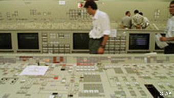 Workers review the control room of the Angra 2 nuclear reactor in Angra dos Reis, Brazil, in this photo taken November 24, 1998. Delayed for more than a decade by cost overruns and safety concerns, the Angra 2 reactor at last will be finished. At a time when the rest of the world is shying away from nuclear power, Brazil has taken the project out of mothballs and touts it as the energy of the future.(AP Photo/Douglas Engle)