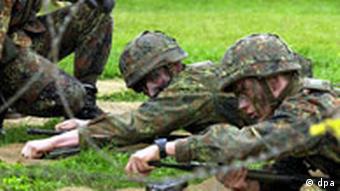 Military recruits in a training exercise