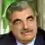 * FILE ** Lebanese Prime Minister Rafik Hariri is seen in this April 19, 2001 file photo. Hariri was Monday, Feb. 14, 2005 killed in a massive bomb explosion that ravaged his motorcade on Beirut's famed seafront corniche Monday, a Cabinet minister said. (AP Photo/Al-Mostaqbal, Nabil Ismail)