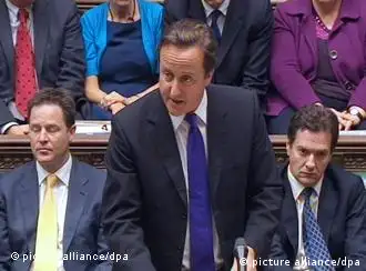epa02832993 A video grabbed image showing British Prime Minister David Cameron (C) making a statement on phone hacking in the House of Commons, London, 20 July 2011. David Cameron faced questions from lawmakers over his party_s links with Rupert Murdoch_s media empire and phone-hacking suspects. Cameron cut short a trip to Africa to return early to Britain, after it emerged that Neil Wallis, a former News of the World deputy editor who has been arrested over the phone-hacking scandal, had been giving 'informal' advice to his own press advisor. That advisor, Andy Coulson, was himself a former News of the World editor, and was forced to resign from both that job and as Cameron_s head of communications over the affair. EPA/PRESS ASSOCIATION UK and Republic of Ireland Out, no commercial sales +++(c) dpa - Bildfunk+++