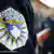 Das Logo der Kosovo Police auf dem Arm eines Polizisten (Foto: dpa)