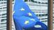 The EU flag is mirrored in the glasswork of the EU Council headquarters in Brussels The EU flag is mirrored in the glasswork of the EU Council headquarters in Brussels