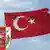 Turkish flag with military emblem