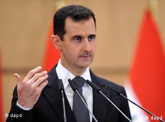 A Syrian shouts anti-Syrian President Bashar al-Assad