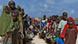 Somali children stand in line to receive food in Mogadishu Somali children stand in line to receive food in Mogadishu