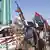 Rebeldes comemoram vitórias sobre tropas de Kadafi