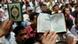 Muslim Brotherhood students hold a copy of the Quran during a protest at the al-Azhar university in Cairo, Egypt, Wednesday, April 16, 2008. Thousands of Muslim Brotherhood students in two Egyptian universities demonstrated Wednesday against the jailing of 25 members of the group for membership of an outlawed organization and anti-government activities. (AP Photo/Hossam Ali) Muslim Brotherhood students hold a copy of the Quran during a protest at the al-Azhar university in Cairo, Egypt, Wednesday, April 16, 2008. Thousands of Muslim Brotherhood students in two Egyptian universities demonstrated Wednesday against the jailing of 25 members of the group for membership of an outlawed organization and anti-government activities. (AP Photo/Hossam Ali)