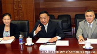 Chen Jian (middle) is optimistic about Sino-German trade relations