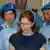 Amanda Noks okružena italinaksim policajcima