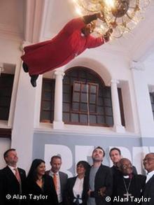 Effigy of Desmond Tutu seen swinging from a chandelier at an art gallery in Cape Town in 2009