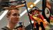 A Pirate Party member works at a computer, with a lego pirate holding a Pirate Party flag in the foreground on his desk A Pirate Party member works at a computer, with a lego pirate holding a Pirate Party flag in the foreground on his desk