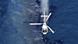 A helicopter sprays a dispersant on an oil slick from the Liberian-flagged container ship MV Rena that is stuck hard aground on a reef 12 nautical miles off the coast of Tauranga, New Zealand, Thursday, Oct. 6, 2011. The 775-foot (236-meter) ship has 1,700 tons of fuel oil and 2,100 shipping containers on board as it sits on the reef at a 10-degree list. (AP Photo/New Zealand Herald, Alan Gibson) AUSTRALIA OUT, NEW ZEALAND OUT A helicopter sprays a dispersant on an oil slick from the Liberian-flagged container ship MV Rena that is stuck hard aground on a reef 12 nautical miles off the coast of Tauranga, New Zealand, Thursday, Oct. 6, 2011. The 775-foot (236-meter) ship has 1,700 tons of fuel oil and 2,100 shipping containers on board as it sits on the reef at a 10-degree list. (AP Photo/New Zealand Herald, Alan Gibson) AUSTRALIA OUT, NEW ZEALAND OUT