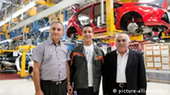 Turkish workers in auto plant