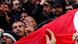 epa02623358 Tunisians stand hold a Tunisian national flag as they celebrate the dissolution of the former ruling party Constitutional Democratic Rally (RCD) by a Tunisian court, in front of the justice Place in Tunis, Tunisia, 09 March 2011. The party had been suspended from official activities in February 2011 by the interior ministry after former president Ben Ali fled abroad on January 14 at the height of a popular uprising to overthrow his autocratic regime. EPA/STRINGER +++(c) dpa - Bildfunk+++ epa02623358 Tunisians stand hold a Tunisian national flag as they celebrate the dissolution of the former ruling party Constitutional Democratic Rally (RCD) by a Tunisian court, in front of the justice Place in Tunis, Tunisia, 09 March 2011. The party had been suspended from official activities in February 2011 by the interior ministry after former president Ben Ali fled abroad on January 14 at the height of a popular uprising to overthrow his autocratic regime. EPA/STRINGER +++(c) dpa - Bildfunk+++
