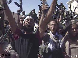Libyans celebrating the capture of Gadhafi