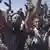 شادمانی مردم لیبی پس از شنیدن خبر دستگیری قذافی