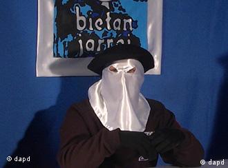 Masked ETA militant