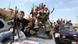 Libyans celebrate the fall of Sirte and death of fugitive former Leader Moammar Gadhafi Libyans celebrate the fall of Sirte and death of fugitive former Leader Moammar Gadhafi
