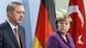 German Chancellor Angela Merkel, right, and Turkey's Prime Minister Recep Tayyip Erdogan, left, address the media during a news conference after a meeting at the Chancellery in Berlin, Germany, Wednesday, Nov. 2, 2011. (Foto:Michael Sohn/AP/dapd) German Chancellor Angela Merkel, right, and Turkey's Prime Minister Recep Tayyip Erdogan, left, address the media during a news conference after a meeting at the Chancellery in Berlin, Germany, Wednesday, Nov. 2, 2011. (Foto:Michael Sohn/AP/dapd)