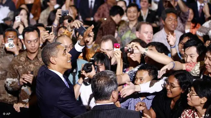 President Barack Obama greets the crowd after he speaks at the University of Indonesia in Jakarta, Indonesia, Wednesday, Nov. 10, 2010. (AP Photo/Charles Dharapak)