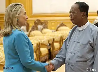 U.S. Secretary of State Hillary Rodham Clinton, left, shakes hands with Khin Aung Myint, speaker of the Upper House of Myanmar Parliament, during a meeting at the Parliamentary Compound in Naypyidaw, Myanmar, Thursday, Dec. 1, 2011. Looking to cement a foreign policy success and prod democratization in one of the world's most isolated and authoritarian nations, U.S. Secretary of State Clinton sought Thursday to test the willingness of Myanmar's leaders to expand nascent reforms. (AP Photo/Saul Loeb, Pool)