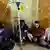 Indian patients take saline as they are treated after drinking toxic alcohol