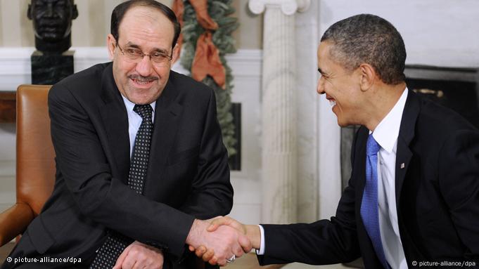 نوری المالکی بطور عراقی وزیر اعظم دسمبر دو ہزار گیارہ میں وائٹ ہاؤس میں امریکی صدر اوباما کے ساتھ