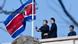 North Korean embassy staff members lower their national flag at half-mast to mourn the death of North Korean leader Kim Jong Il on the roof of the embassy in Beijing, China, Monday, Dec. 19, 2011. Kim Jong Il, North Korea's mercurial and enigmatic longtime leader, has died of heart failure. He was 69. (AP Photo/Andy Wong) North Korean embassy staff members lower their national flag at half-mast to mourn the death of North Korean leader Kim Jong Il on the roof of the embassy in Beijing, China, Monday, Dec. 19, 2011. Kim Jong Il, North Korea's mercurial and enigmatic longtime leader, has died of heart failure. He was 69. (AP Photo/Andy Wong)