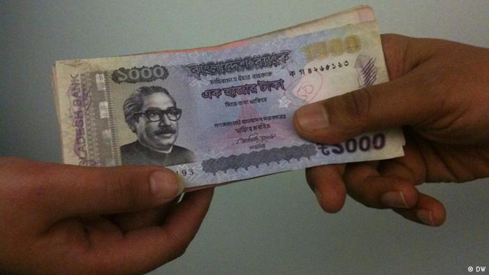 Symbolbild Bangladesch Korruption Banknoten Geld Bestechung