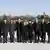 The South Korean mourners group led by Lee Hee-ho, center, the wife of former South Korean President Kim Dae-jung, poses for a photo upon arrival at Pyongyang in North Korea early Monday, Dec. 26, 2011. Lee is part of an 18-person group allowed by South Korea to attend the Dec. 28 funeral of late North Korean leader Kim Jong Il. (Foto:AP/dapd)