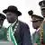 Nigerian President Goodluck Jonathan, second from left, standing with army generals