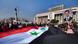 epa03049295 A handout photo released by the official Syrian Arab News Agency (SANA) showing Syrian supporters of President Bashar al-Assad carrying his pictures and waving Syrian national flags during a rally at Sabe Bahrat square, Damascus, Syria, on 04 January 2012. The Syrian opposition 04 January accused the government of President Bashar al-Assad of misleading an Arab League mission, piling more pressure on the regional body to withdraw observers inspecting Damascus's compliance with a peace plan. The opposition says the mission is providing Syria with a cover to continue its crackdown on protesters. Amid those calls, the Arab League has faced calls to withdraw the observers or lose its credibility. EPA/SANA / HANDOUT epa03049295 A handout photo released by the official Syrian Arab News Agency (SANA) showing Syrian supporters of President Bashar al-Assad carrying his pictures and waving Syrian national flags during a rally at Sabe Bahrat square, Damascus, Syria, on 04 January 2012. The Syrian opposition 04 January accused the government of President Bashar al-Assad of misleading an Arab League mission, piling more pressure on the regional body to withdraw observers inspecting Damascus's compliance with a peace plan. The opposition says the mission is providing Syria with a cover to continue its crackdown on protesters. Amid those calls, the Arab League has faced calls to withdraw the observers or lose its credibility. EPA/SANA / HANDOUT