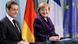 French President Nicolas Sarkozy (L) and German Chancellor Angela Merkel smile as they address a news conference following their talks at the Chancellery in Berlin January 9, 2012. REUTERS/Fabrizio Bensch (GERMANY - Tags: POLITICS) French President Nicolas Sarkozy (L) and German Chancellor Angela Merkel smile as they address a news conference following their talks at the Chancellery in Berlin January 9, 2012. REUTERS/Fabrizio Bensch (GERMANY - Tags: POLITICS)