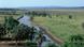 A river runs through a green landscape in the Afar region of Ethiopia A river runs through a green landscape in the Afar region of Ethiopia