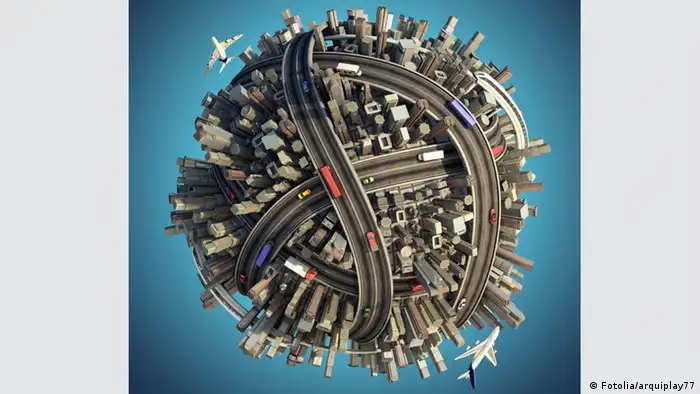 Miniature planet as concept for chaotic urban life isolated with clipping path. #28179983 Fotolia © arquiplay77