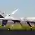 Unmanned Predator B drone taxis back to hangar