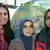 Ayesha Hasan aus Pakistan, Tamana Jamily aus Afghanistan und Benish Ali Bhat aus Indien (v.l.) im DW-Funkhaus in Bonn