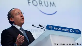 epa03079859 Felipe Calderon, President of Mexico, speaks during a plenary session at the 42nd Annual Meeting of the World Economic Forum, WEF, in Davos, Switzerland, 26 January 2012. The overarching theme of the Meeting, which will take place from 25 to 29 January, is 'The Great Transformation: Shaping New Models'. EPA/JEAN-CHRISTOPHE BOTT