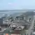 Blick auf den Hafen von Maputo, Hauptstadt von Mosambik. Aufnahme vom 09.11.2010. Foto: Lazlo Trankovits dpa Schlagworte Geografie, Häfen, Städte, Stadtansicht, Hochhäuser, Verladekräne