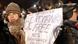 A Romanian woman holds a placard while facing a strong blizzard during a protest at University Plaza in Bucharest, Romania, 25 January 2012. Demonstrators from all over the country demanded the government to resign and asked for anticipate elections, joining the nation-wide spread protests which entered into the thirteenth consecutive day. Romanian Prime Minister Emil Boc announced on 23 January that he fired the foreign minister, Teodor Baconschi, due to the insulting remarks he made about anti-government protesters. EPA/ROBERT GHEMENT +++(c) dpa - Bildfunk+++ Schlagworte CITIZENS INITIATIVE & RECALL, CITIZENS INITIATIVE & A Romanian woman holds a placard while facing a strong blizzard during a protest at University Plaza in Bucharest, Romania, 25 January 2012. Demonstrators from all over the country demanded the government to resign and asked for anticipate elections, joining the nation-wide spread protests which entered into the thirteenth consecutive day. Romanian Prime Minister Emil Boc announced on 23 January that he fired the foreign minister, Teodor Baconschi, due to the insulting remarks he made about anti-government protesters. EPA/ROBERT GHEMENT +++(c) dpa - Bildfunk+++ Schlagworte CITIZENS INITIATIVE & RECALL, CITIZENS INITIATIVE &