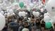 Protesters gather with balloons and placards at an anti-Putin demonstration Protesters gather with balloons and placards at an anti-Putin demonstration