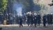 Egyptian security forces fire tear gas at protesters during clashes near the Interior Ministry in Cairo Egyptian security forces fire tear gas at protesters during clashes near the Interior Ministry in Cairo