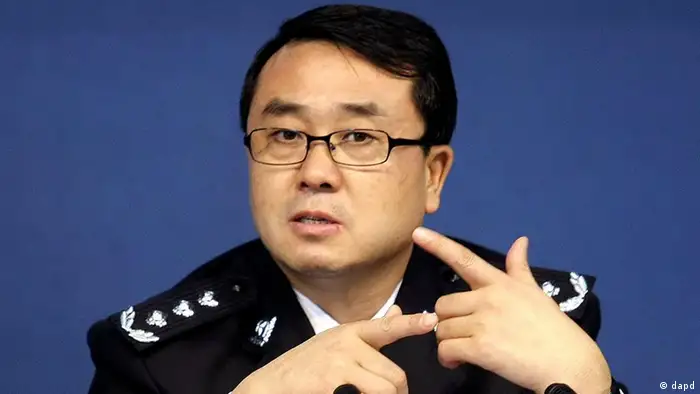 In this Oct. 21, 2008 photo, Chongqing city police chief Wang Lijun reacts during a press conference in the southwestern China city. Wang, the country's most famous policeman, has dropped from sight amid unconfirmed reports of a political scandal and a bid for U.S. asylum. (AP Photo) CHINA OUT