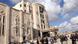 Syrian security forces gather in front a damaged building at a security compound in the northern city of Aleppo Syrian security forces gather in front a damaged building at a security compound in the northern city of Aleppo
